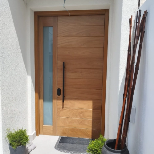 puerta iroko macizo